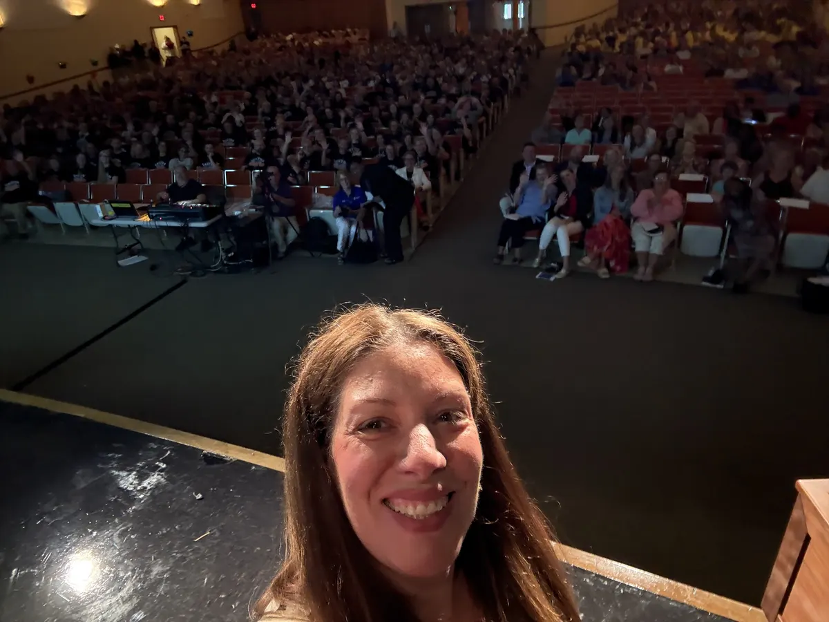 Emily Jackson addressing a packed auditorium